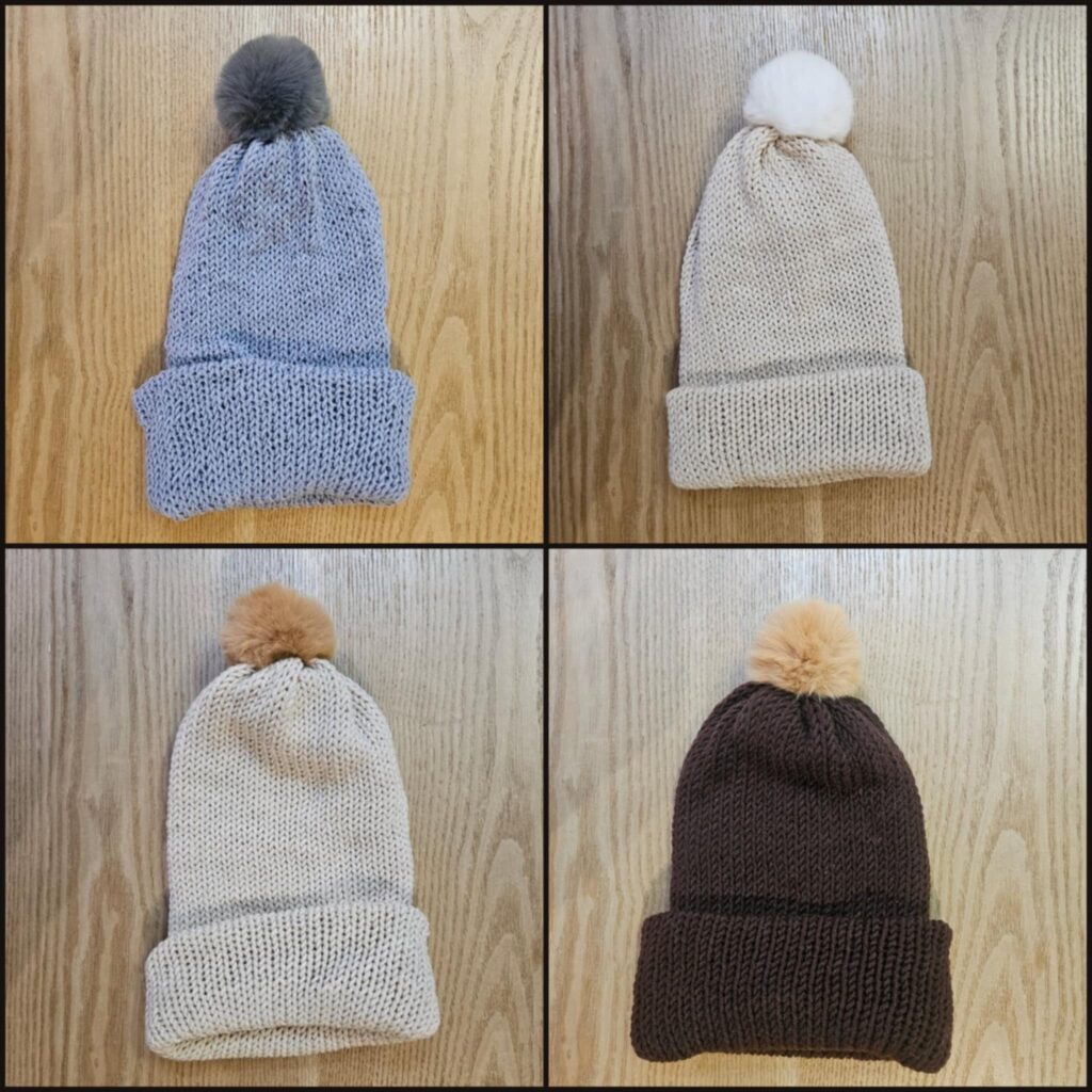 Tuque en laine avec pompon en fourrure synthétique <br> de <strong>Roméo Ambiance</strong>